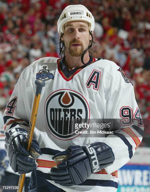 Ryan Smyth of the Edmonton Oilers looks on against the Carolina Hurricanes during game seven of the 2006 NHL Stanley Cup Finals on June 19, 2006 at...