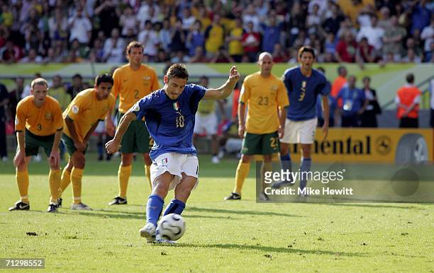 Francesco Totti of Italy scores the match winning penalty during the FIFA World Cup Germany 2006 Round of 16 match between Italy and Australia at the...