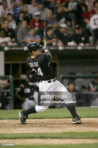 Infielder Joe Crede of the Chicago White Sox swings at a St. Louis Cardinals pitch on June 20, 2006 at U.S. Cellular Field in Chicago, Illinois. The...