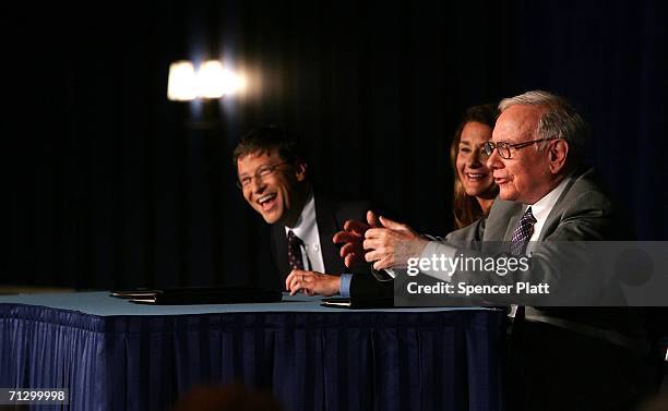 Warren Buffett speaks to the media with Bill and Melinda Gates June 26, 2006 at a news conference where Buffett spoke about his financial gift to the...