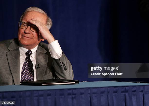 Warren Buffett attends a news conference with Bill and Melinda Gates June 26, 2006 where Buffett spoke about his financial gift to the Bill and...