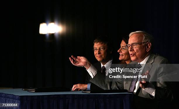 Warren Buffett speaks to the media with Bill and Melinda Gates June 26, 2006 at a news conference where Buffett spoke about his financial gift to the...