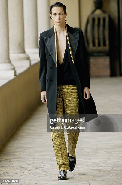 Model walks down the runway at the Alexander McQueen show as part of Milan Menswear Spring/Summer 2007 Collections on June 26, 2006 in Milan, Italy.