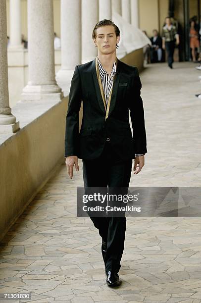 Model walks down the runway at the Alexander McQueen show as part of Milan Menswear Spring/Summer 2007 Collections on June 26, 2006 in Milan, Italy.