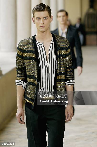 Model walks down the runway at the Alexander McQueen show as part of Milan Menswear Spring/Summer 2007 Collections on June 26, 2006 in Milan, Italy.