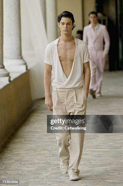 Model walks down the runway at the Alexander McQueen show as part of Milan Menswear Spring/Summer 2007 Collections on June 26, 2006 in Milan, Italy.