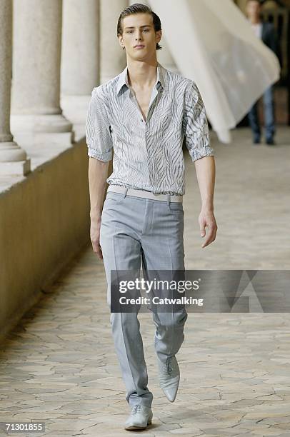 Model walks down the runway at the Alexander McQueen show as part of Milan Menswear Spring/Summer 2007 Collections on June 26, 2006 in Milan, Italy.