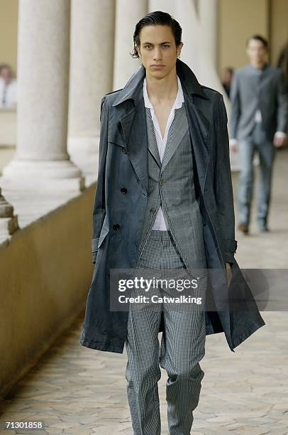 Model walks down the runway at the Alexander McQueen show as part of Milan Menswear Spring/Summer 2007 Collections on June 26, 2006 in Milan, Italy.