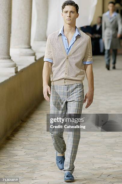 Model walks down the runway at the Alexander McQueen show as part of Milan Menswear Spring/Summer 2007 Collections on June 26, 2006 in Milan, Italy.