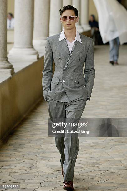 Model walks down the runway at the Alexander McQueen show as part of Milan Menswear Spring/Summer 2007 Collections on June 26, 2006 in Milan, Italy.