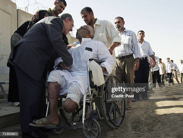 Iraqi National Security Adviser Muwafaq al-Rubai greets newly released detainees from Abu Ghraib on June 27, 2006 in Baghdad, Iraq. Another 500...