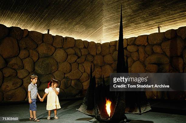 Jewish children visit the Holocaust Museum where the Eternal Flame is a reminder to all of the atrocities committed by the Nazis in the World War II...