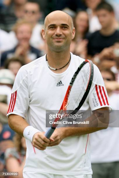 Andre Agassi of the United States acknowledges the crowd ahead of his match against Boris Pashanski of Serbia and Montenegro during day two of the...