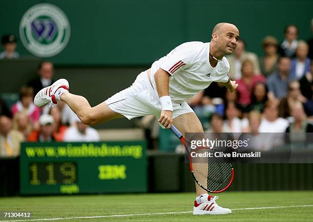 Andre Agassi of the United States serves against Boris Pashanski of Serbia and Montenegro during day two of the Wimbledon Lawn Tennis Championships...