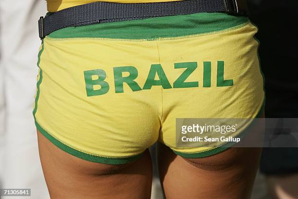 Brazil soccer fan wears the country's name on her shorts while watching the Round of 16 match against Ghana in the FIFA World Cup 2006 at an open-air...