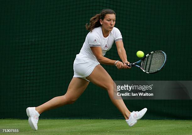Antonella Serra Zanetti of Italy in action against Patty Schnyder of Switzerland during day two of the Wimbledon Lawn Tennis Championships at the All...