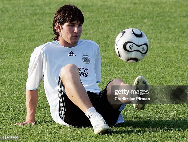 Lionel Messi of Argentina plays with a ball during a training session at the Adi-Dassler Sports Field on June 27, 2006 in Herzogenaurach, Germany....