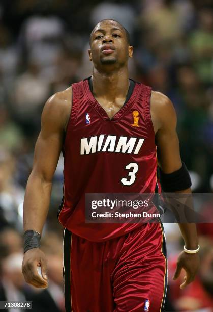 Dwyane Wade of the Miami Heat walks down the court in game six of the 2006 NBA Finals on June 20, 2006 at American Airlines Center in Dallas, Texas....