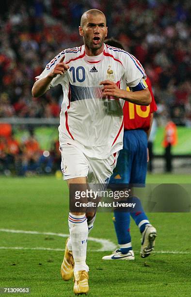 Zinedine Zidane of France celebrates scoring his team's third goal during the FIFA World Cup Germany 2006 Round of 16 match between Spain and France...