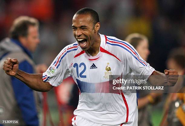 French forward Thierry Henry celebrates at the end of the World Cup 2006 round of 16 football game Spain vs. France, 27 June 2006 at Hanover stadium....