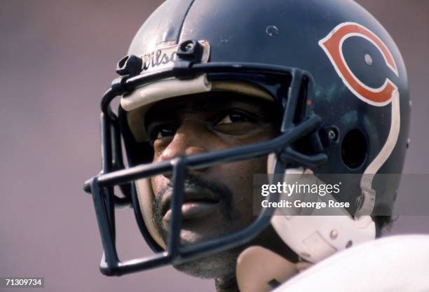 Running back Walter Payton of the Chicago Bears looks on as he plays in his last regular season game against the Los Angeles Raiders at the Los...