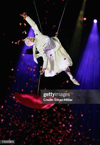 An aerialist performs during a preview of "The Beatles LOVE by Cirque du Soleil" at The Mirage Hotel & Casino June 27, 2006 in Las Vegas, Nevada. The...