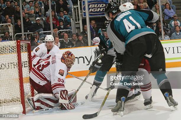 Goaltender Brian Boucher of the Phoenix Coyotes blocks a shot during a game against the San Jose Sharks on December 28, 2005 at the HP Pavilion in...