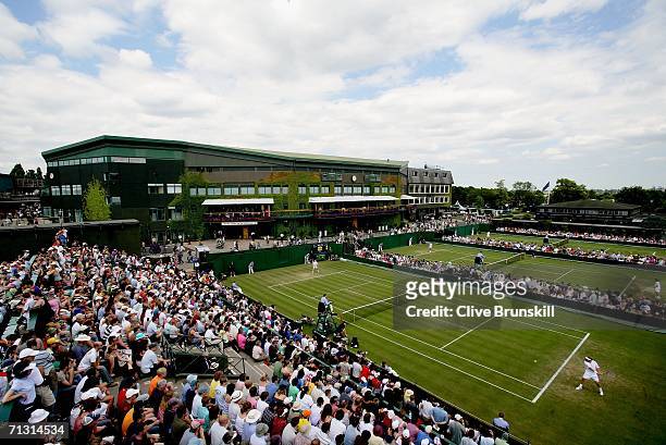 General view of the outside courts taken during day three of the Wimbledon Lawn Tennis Championships at the All England Lawn Tennis and Croquet Club...