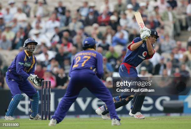 Alastair Cook of England hits out during the fourth Natwest One Day International match between England and Sri Lanka at Old Trafford on June 28,...