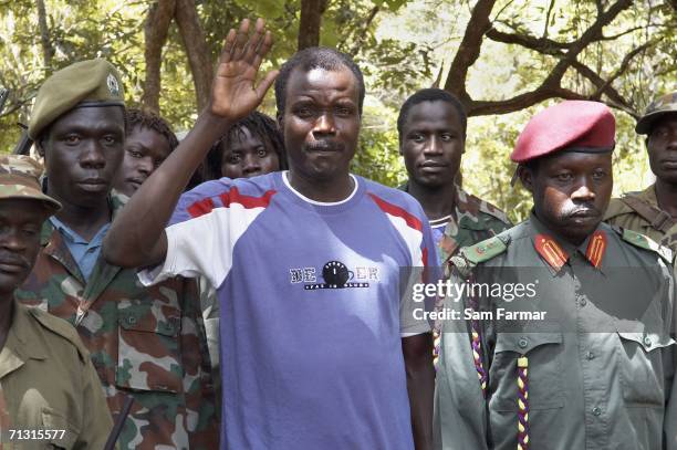 Joseph Kony , the leader of the Ugandan rebel group, the Lord's Resistance Army is flanked by his LRA deputies, including senior commander Okot...