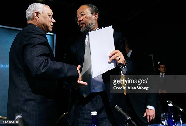 Time Warner Inc. Chairman & CEO Richard Parsons shakes hands with former Secretary of State Colin Powell after a news conference to announce the lead...