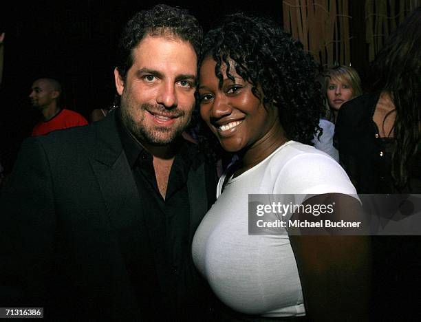 Director Brett Ratner and Mimi Brown of Us Weekly attend the 3rd Annual Work Hard, Play Harder Lounge at the W Hotel on June 25, 2006 in Los Angeles,...