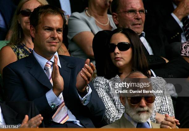 Entrepreneur and TV presenter Peter Jones watches Centre Court action during day three of the Wimbledon Lawn Tennis Championships at the All England...