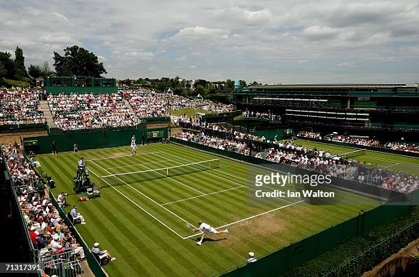 General view of the outside courts taken during day three of the Wimbledon Lawn Tennis Championships at the All England Lawn Tennis and Croquet Club...