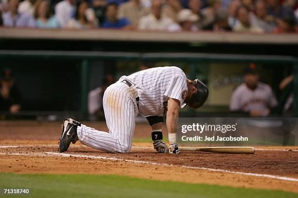 Infielder Craig Biggio of the Houston Astros grimaces in pain during the game against the San Francisco Giants at Minute Maid Park on May 15, 2006 in...