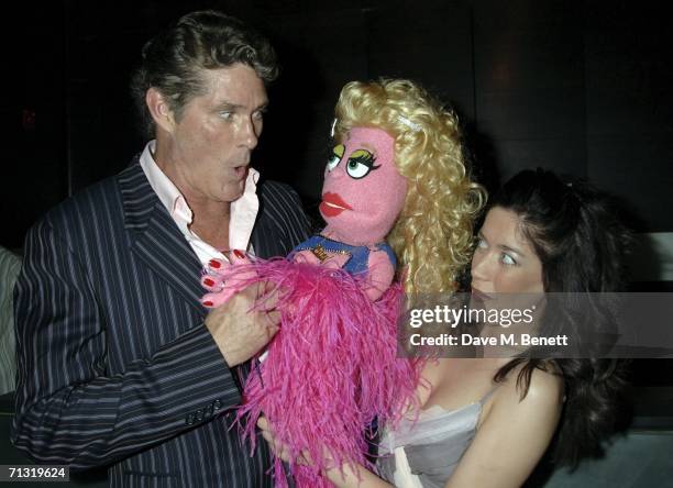 Actor David Hasselhoff poses with puppeteer Julie Atherton and her puppet Lucy The Slut at the after party following the UK Premiere of the new play...