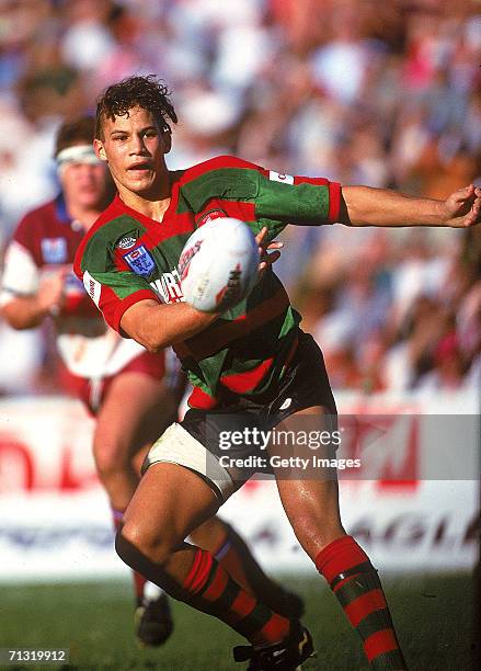 Tyran Smith of the Rabbitohs offloads the ball during a NSWRL match between the South Sydney Rabbitohs and the Manly Sea Eagles played in Sydney,...