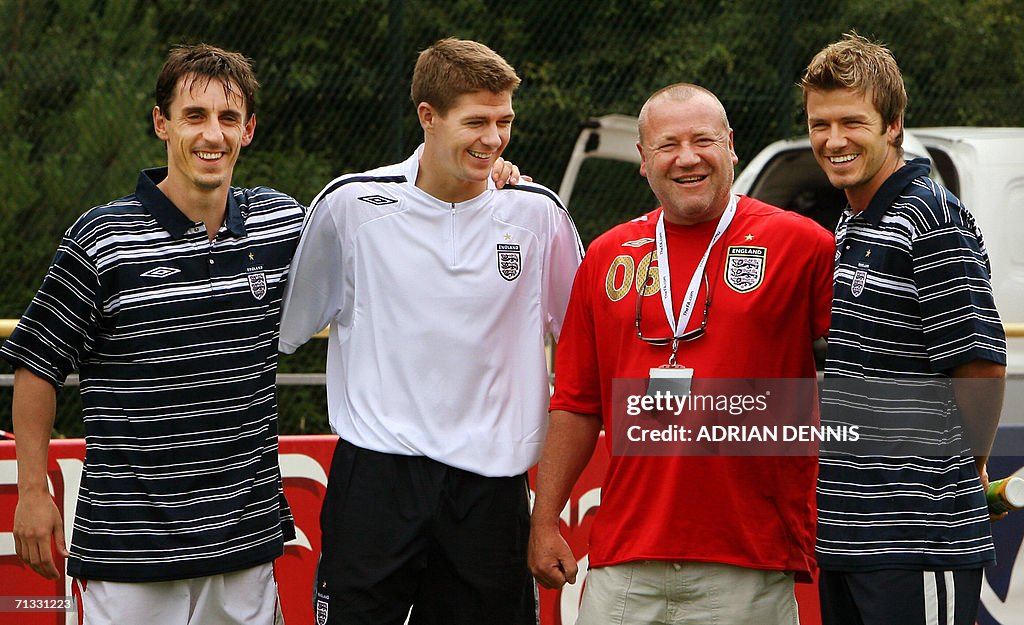 England players Gary Neville (L) Steven