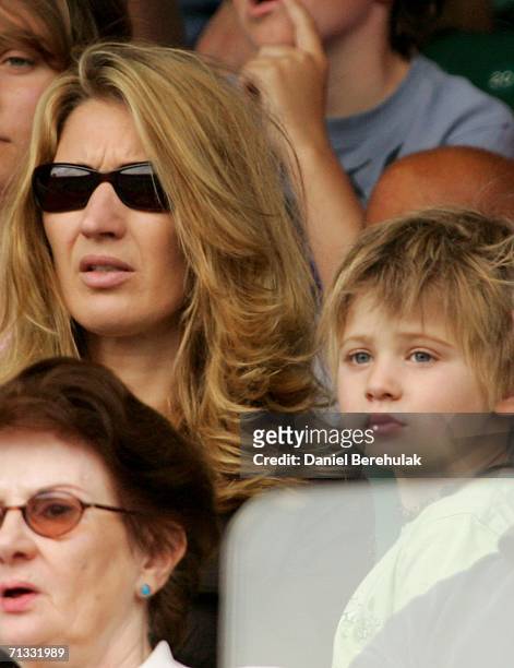 Steffi Graf wife of Andre Agassi and their son Jaden Gil watch Andre Agassi of The United States and Andreas Seppi of Italy on Centre Court during...