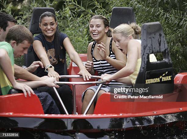 Michaela Henderson-Thyne , girlfriend of Stewart Downing and Coleen McLaughlin laugh after getting a soaking at the Europa theme park on June 29,...