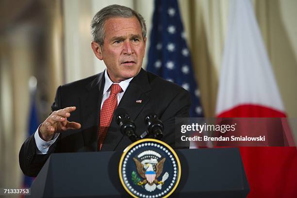 President George W. Bush speaks during a news conference in the East Room of the White House June 29, 2006 in Washington, DC. Prime Minister Koizumi...