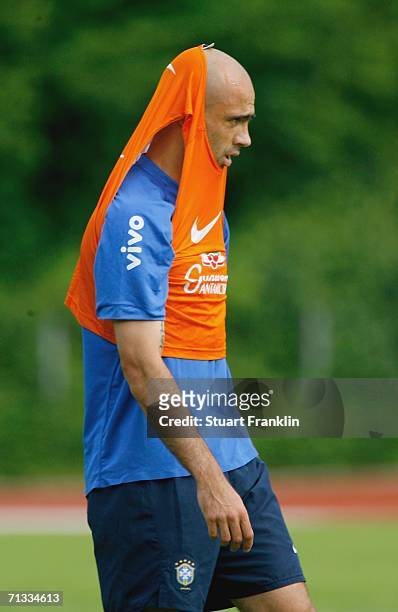 Cris of Brazil has his bib over his head during the Brazil National Football Team training session for the FIFA World Cup Germany 2006 at the...