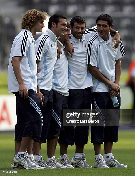 Juan Riquelme poses with team mates during the Argentina National Football Team training session at the Olympic Stadium Berlin on June 29, 2006 in...