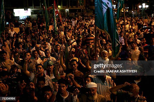 Palestinian supporters of the ruling Hamas party demonstrate in the West Bank city of Nablus, 29 June 2006. The European Union expressed deep concern...