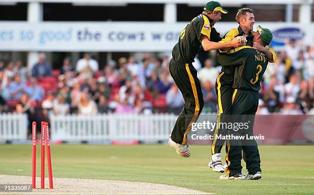 David Masters of Leicestershire is congratulated by team mates, after bowling Nathan Astle of Lancashire during the Twenty20 match between...