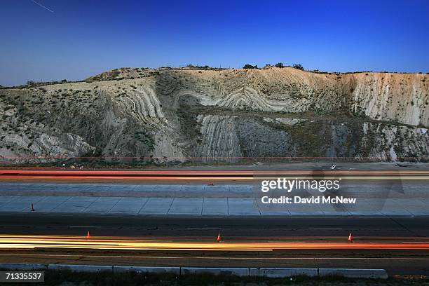 Layers of earthquake-twisted ground are seen at dusk where the 14 freeway crosses the San Andreas Fault on June 28, 2006 near Palmdale, California....