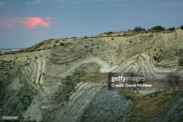 Layers of earthquake-twisted ground are seen at dusk where the 14 freeway crosses the San Andreas Fault on June 28, 2006 near Palmdale, California....
