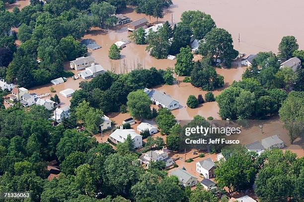 Flooded areas along the Delaware River are shown June 29, 2006 south of Trenton, New Jersey. Days of heavy rain have forced thousands to evacuate...