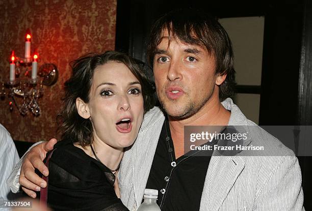 Actress Winona Ryder and director Richard Linklater pose at the Los Angeles premiere after party of "A Scanner Darkly" during Los Angeles Film...