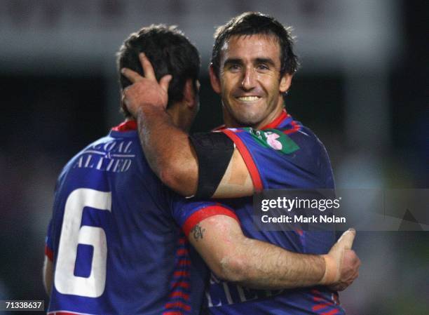 Jarrod Mullen and Andrew Johns of the Knights celebrate their win after the round 17 NRL match between the Manly Warringah Sea Eagles and the...